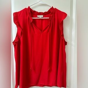 Ruffled edge red blouse
